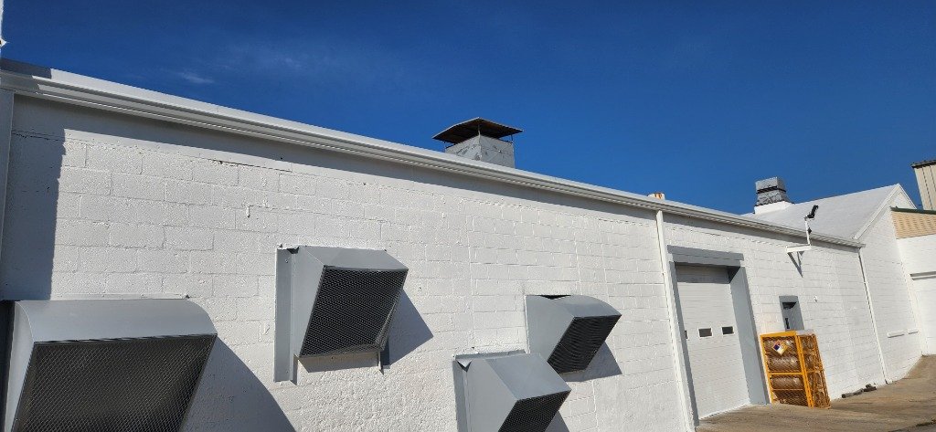 Clean gutters with guards installed on a Baltimore home